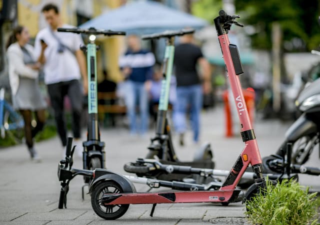 12 June 2020, Hamburg: E-scooters are parked on a sidewalk in Hamburg's Schanzenviertel. The small electric scooters have been on German roads for a year now. Photo: Axel Heimken/dpa (Photo by Axel Heimken/picture alliance via Getty Images)
