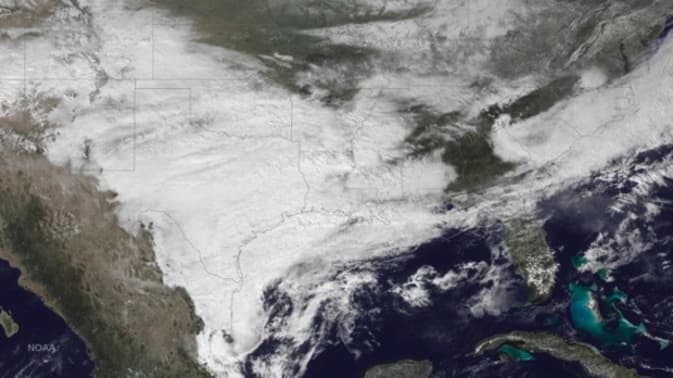 The weather system bringing winter weather to parts of the western and southern U.S. is seen in a NOAA GOES East satellite image taken at 2:45pm ET (19:45GMT) February 23, 2015. An ice storm that hit wide parts of Texas and neighboring states on Monday knocked out power to thousands of people, led to hundreds of traffic accidents and caused nearly 1,500 flight cancellations nationwide. REUTERS/NOAA/Handout via Reuters (UNITED STATES - Tags: SCIENCE TECHNOLOGY ENVIRONMENT) FOR EDITORIAL USE ONLY. NOT FOR SALE FOR MARKETING OR ADVERTISING CAMPAIGNS. THIS IMAGE HAS BEEN SUPPLIED BY A THIRD PARTY. IT IS DISTRIBUTED, EXACTLY AS RECEIVED BY REUTERS, AS A SERVICE TO CLIENTS - TM3EB2N18I101