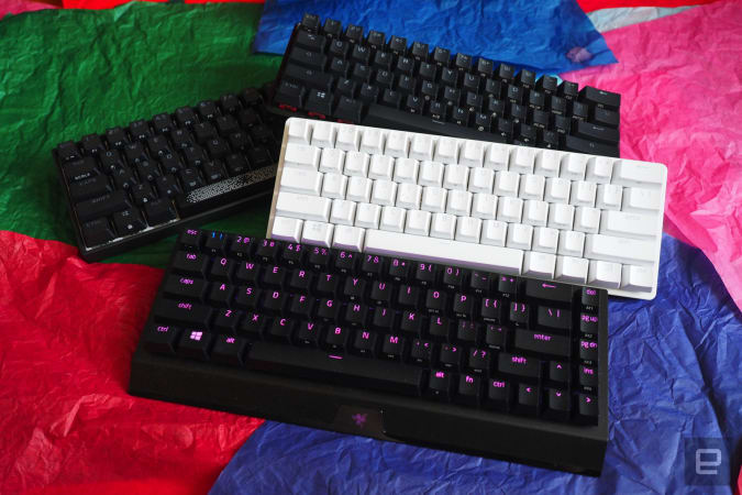 60-percent keyboards on a bed of colored paper