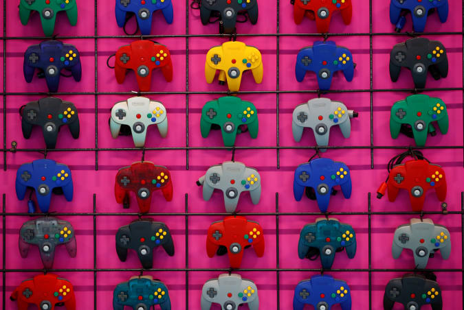 Variations of the Nintendo 64 controller are displayed during the media day of Gamescom in Cologne, Germany August 20, 2019. REUTERS/Wolfgang Rattay