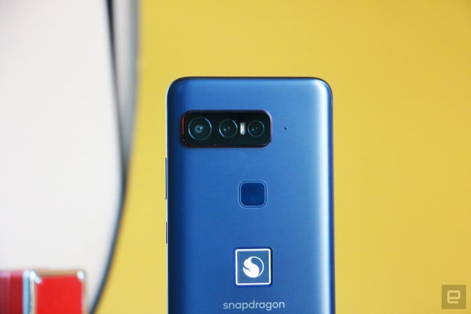 The Smartphone for Snapdragon Insiders with its rear facing the camera against a yellow background. 