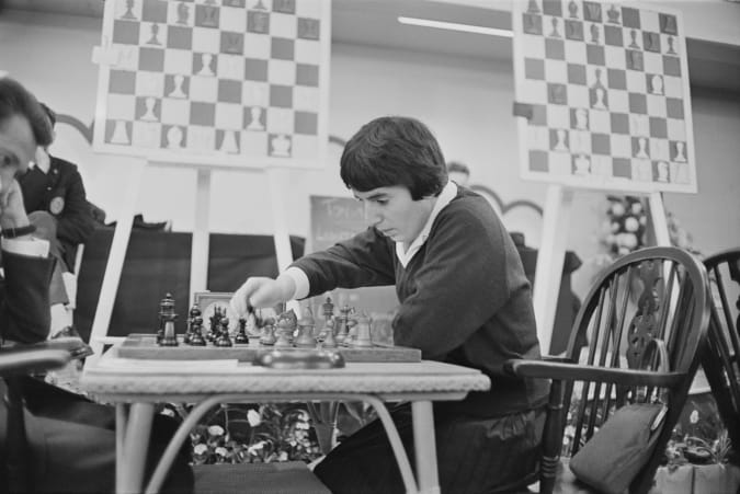 Georgian chess player and women's world chess champion, Nona Gaprindashvili of the Soviet Union, pictured playing a game of chess at the International Chess Congress in London on 30th December 1964. (Photo by Stanley Sherman/Daily Express/Hulton Archive/Getty Images)