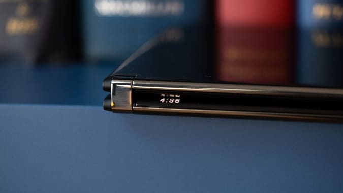 The Microsoft Surface Duo 2's glance bar showing the time through the hinge.