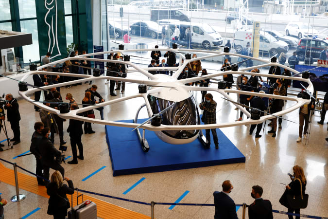 A prototype of an electrical air taxi by German company Volocopter is seen during a presentation at the Fiumicino airport, in Rome, Italy, October 27, 2021. REUTERS/Guglielmo Mangiapane
