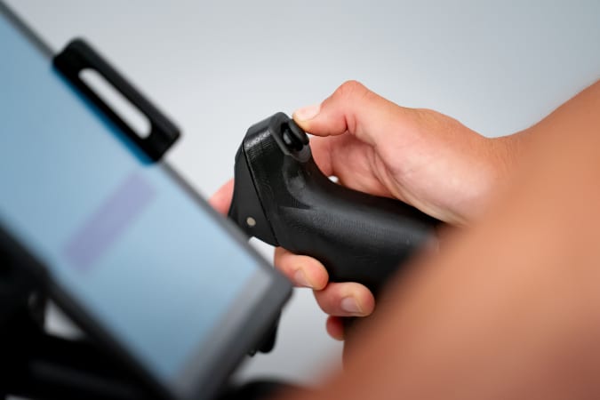 The thumbstick control on a Muoverti TiltBike.