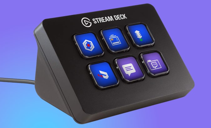 The Elgato Stream Deck Mini controller against a purple and blue background.