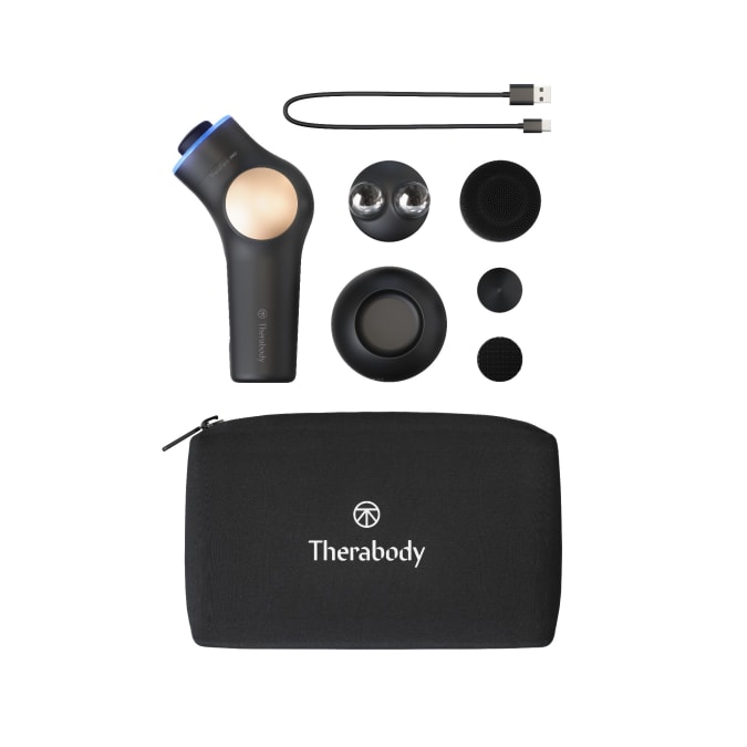 The TheraFace Pro and its accompanying attachments, charging cable and carrying case.