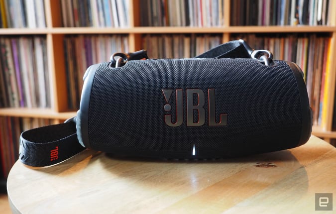 The JBL Xtreme 3 photographed for Engadget's 2022 portable Bluetooth speaker guide in front of a shelf full of records.