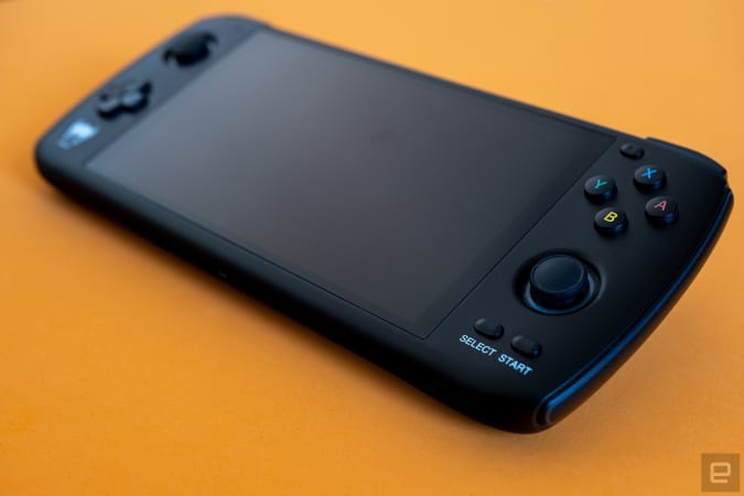 The new retro handheld from Ayn, called the Odin, is pictured with a close up of the main buttons and analog stick.