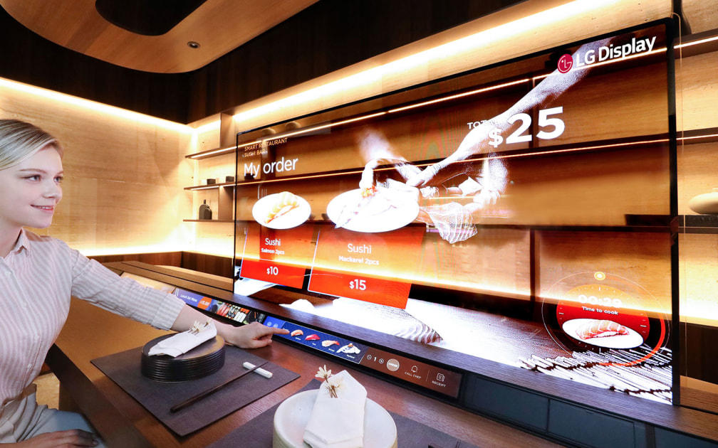 LG Display’s transparent OLED places a screen between you and the sushi chef