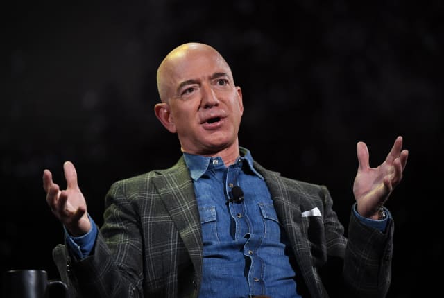 Amazon Founder and CEO Jeff Bezos addresses the audience during a keynote session at the Amazon Re:MARS conference on robotics and artificial intelligence at the Aria Hotel in Las Vegas, Nevada on June 6, 2019. (Photo by Mark RALSTON / AFP) (Photo credit should read MARK RALSTON/AFP via Getty Images)