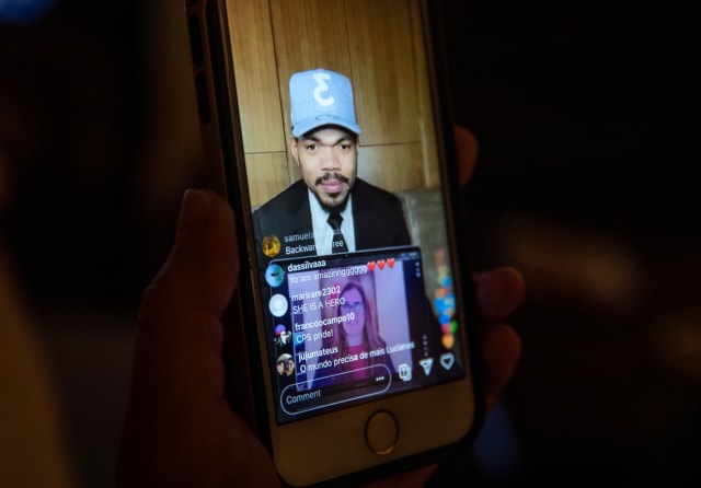 STAMFORD, CONNECTICUT - MAY 7: Chance the Rapper and elementary school teacher Luciana Lira, 42, speak via Instagram Live during the artist's Twilight Awards event honoring teachers on May 7, 2020 in Stamford, Connecticut. He announced Lira would receive $15,000 for herself, $15,000 for her school and a computer and a year of internet for the immigrant family that Lira is helping. Lira, a K-5 Bilingual /ESL teacher at Hart Magnet Elementary in Stamford, became the temporary guardian of newborn baby Neysel after the boy's mother Zully, almost 8 months pregnant, went to the Stamford Hospital emergency room, gravely ill with COVID-19 and gave birth. Hospital staff put Zully on a ventilator and performed an emergency C-section to save the child. Neysel could not go home, as his father Marvin and brother Junior were COVID-19 positive and quarantined there. After several weeks in the hospital ICU Zully responded well to antibody blood plasma transfusions and was able to return home. The teacher Lira will continue caring for the baby until the infant's parents and brother test COVID-negative, and the Guatemalan immigrant family can be reunited. Chance the Rapper is giving a total of $300,000 to teachers and their schools during this year's inaugural event. (Photo by John Moore/Getty Images)