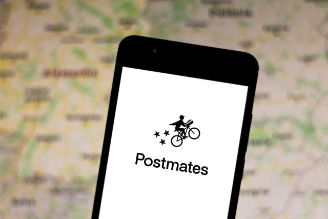 BRAZIL - 2019/06/07: In this photo illustration a Postmates logo is displayed on a smartphone. (Photo by Rafael Henrique/SOPA Images/LightRocket via Getty Images)