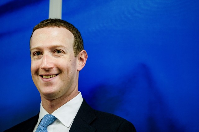 Founder and CEO of US online social media and social networking service Facebook Mark Zuckerberg reacts upon his arrival for a meeting with European Commission vice-president in charge for Values and Transparency, in Brussels, on February 17, 2020. (Photo by Kenzo TRIBOUILLARD / AFP) (Photo by KENZO TRIBOUILLARD/AFP via Getty Images)