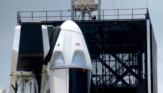 The Crew Dragon capsule sits on top of the SpaceX Falcon 9 rocket at Launch Complex 39-A at Kennedy Space Center, Fla., Friday, May 29, 2020. The second launch attempt of the Demo-2 mission is scheduled for Saturday at 3:22pm. (Joe Burbank/Orlando Sentinel/Tribune News Service via Getty Images)