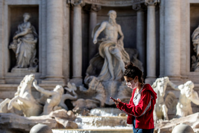 Rome. Phase 2 Daily life in the capital pictured a girl in Trevi Fountain. (Photo by: Francesco Fotia/AGF/Universal Images Group via Getty Images)