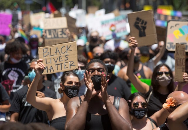People take part in an All Black Lives Matter march, organized by Black LGBTQ+ leaders, in the aftermath of the death in Minneapolis police custody of George Floyd, in Hollywood, Los Angeles, California, U.S., June 14, 2020. REUTERS/Ringo Chiu