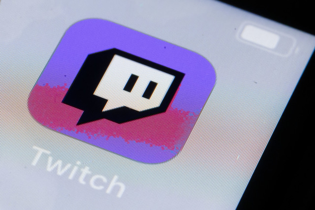 BERLIN, GERMANY - OCTOBER 11: In this photo illustration the logo of live streaming video platform Twitch is displayed on a smartphone on October 11, 2019 in Berlin, Germany. (Photo Illustration by Thomas Trutschel/Photothek via Getty Images)
