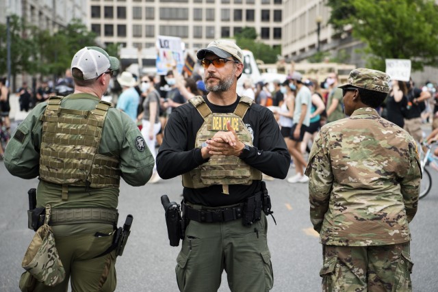 UNITED STATES - JUNE 06: Drug Enforcement Administration police are seen as demonstrators marched to Freedom Plaza from Capitol Hill to honor George Floyd and victims of racial injustice on Saturday, June 6, 2020. (Photo By Tom Williams/CQ-Roll Call, Inc via Getty Images)