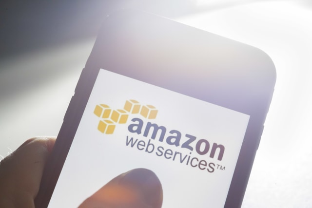 Berlin, Germany - July 09: In this photo illustration the Logo of Amazon Web Services ( AWS ) is displayed on a smartphone on July 09, 2019 in Berlin, Germany. (Photo by Thomas Trutschel/Photothek via Getty Images)