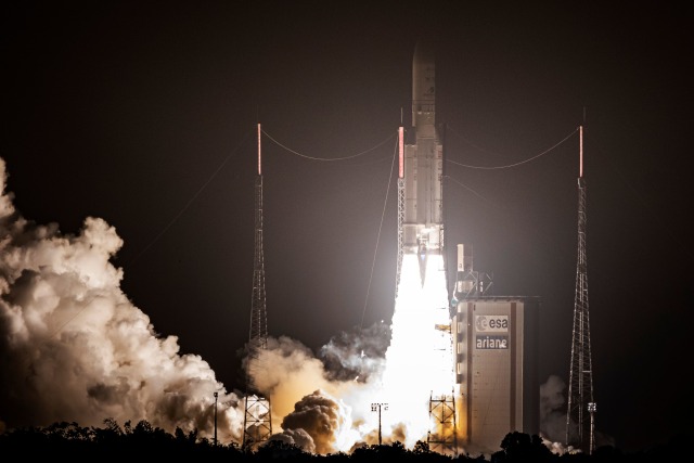 This picture shows an Ariane 5 rocket carrying two telecommunications satellites, SKY Perfect JSAT Corporations JCSAT-17 and GEO-KOMPSAT-2B for the Korea Aerospace Research Institute (KARI), lifting off from its launchpad in Kourou, at the European Space Center in French Guiana, on February 18, 2020.  (Photo by jody amiet / AFP) (Photo by JODY AMIET/AFP via Getty Images)