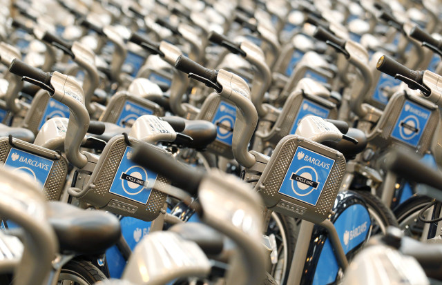 New bicycles for hire stand in rows after being assembled at a storage facility in London, July 9, 2010, before the launch of a public bicycle sharing scheme for short journeys on July 30. The scheme, aimed at tackling overcrowding on the capital's commuter networks, is expected to generate an additional 40,000 bicycle journeys per day in the city. REUTERS/Suzanne Plunkett (BRITAIN - Tags: SOCIETY TRANSPORT)