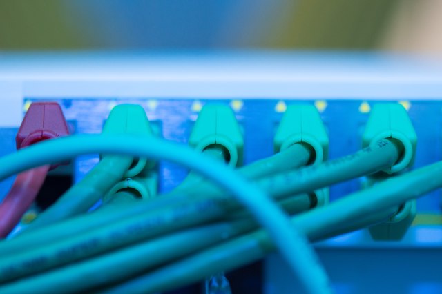 23 November 2018, Saxony, Dresden: Network cable in the server room of the state enterprise Sächsische Informatik Dienste. On the same day, a press conference simulated a cyber attack scenario on a computer system. In the course of the simulated attack, the further development of e-government regulations was also explained. Photo: Sebastian Kahnert/dpa-Zentralbild/dpa (Photo by Sebastian Kahnert/picture alliance via Getty Images)