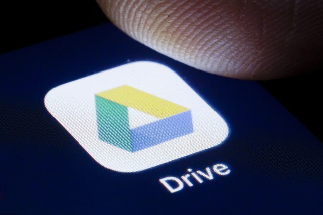 BERLIN, GERMANY - APRIL 22: The logo of the filehosting service Google Drive is shown on the display of a smartphone on April 22, 2020 in Berlin, Germany. (Photo by Thomas Trutschel/Photothek via Getty Images)