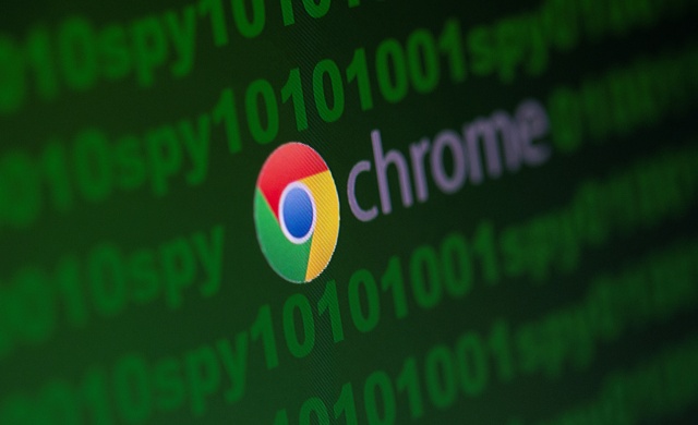 Google Chrome logo is seen near cyber code and words "spy" in this illustration picture taken June 18, 2020. REUTERS/Dado Ruvic/Illustration
