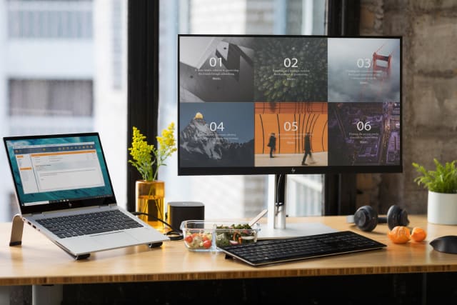 HP E27q G4 monitor paired with a laptop