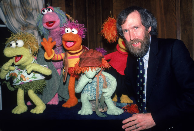 American film & televison director and puppeteer Jim Henson (1936 - 1990) poses with several of his Fraggle Rock muppets, 1983. (Photo by Ann Clifford/DMI/The LIFE Picture Collection via Getty Images)