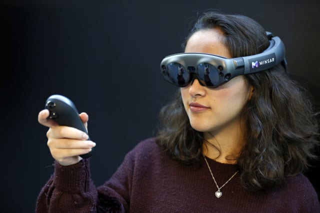 PARIS, FRANCE - NOVEMBER 21: A visitor tries a virtual reality helmet Magic Leap One during the Virtuality Paris 2019 show on November 21, 2019 in Paris, France. Magic Leap is an American startup working on augmented reality technology. The virtual reality show and immersive technologies, Virtuality takes place from 21 to 23 November 2019 in Paris. (Photo by Chesnot/Getty Images)