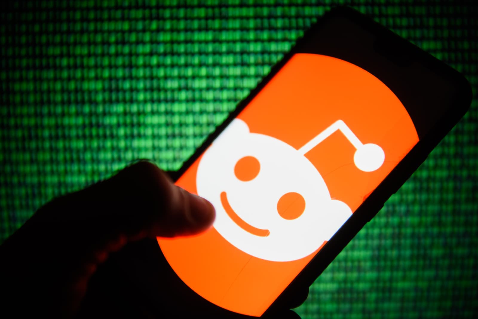 Reddit logo is seen on an android mobile phone...