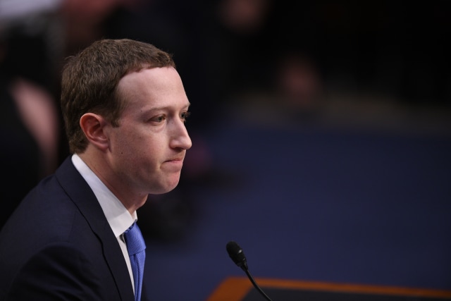 Facebook CEO Mark Zuckerberg testifies before a joint hearing of the US Senate Commerce, Science and Transportation Committee and Senate Judiciary Committee on Capitol Hill, April 10, 2018 in Washington, DC. Zuckerberg, making his first formal appearance at a Congressional hearing, seeks to allay widespread fears ignited by the leaking of private data on tens of millions of users to British firm Cambridge Analytica working on Donald Trump's 2016 presidential campaign. / AFP PHOTO / JIM WATSON        (Photo credit should read JIM WATSON/AFP via Getty Images)