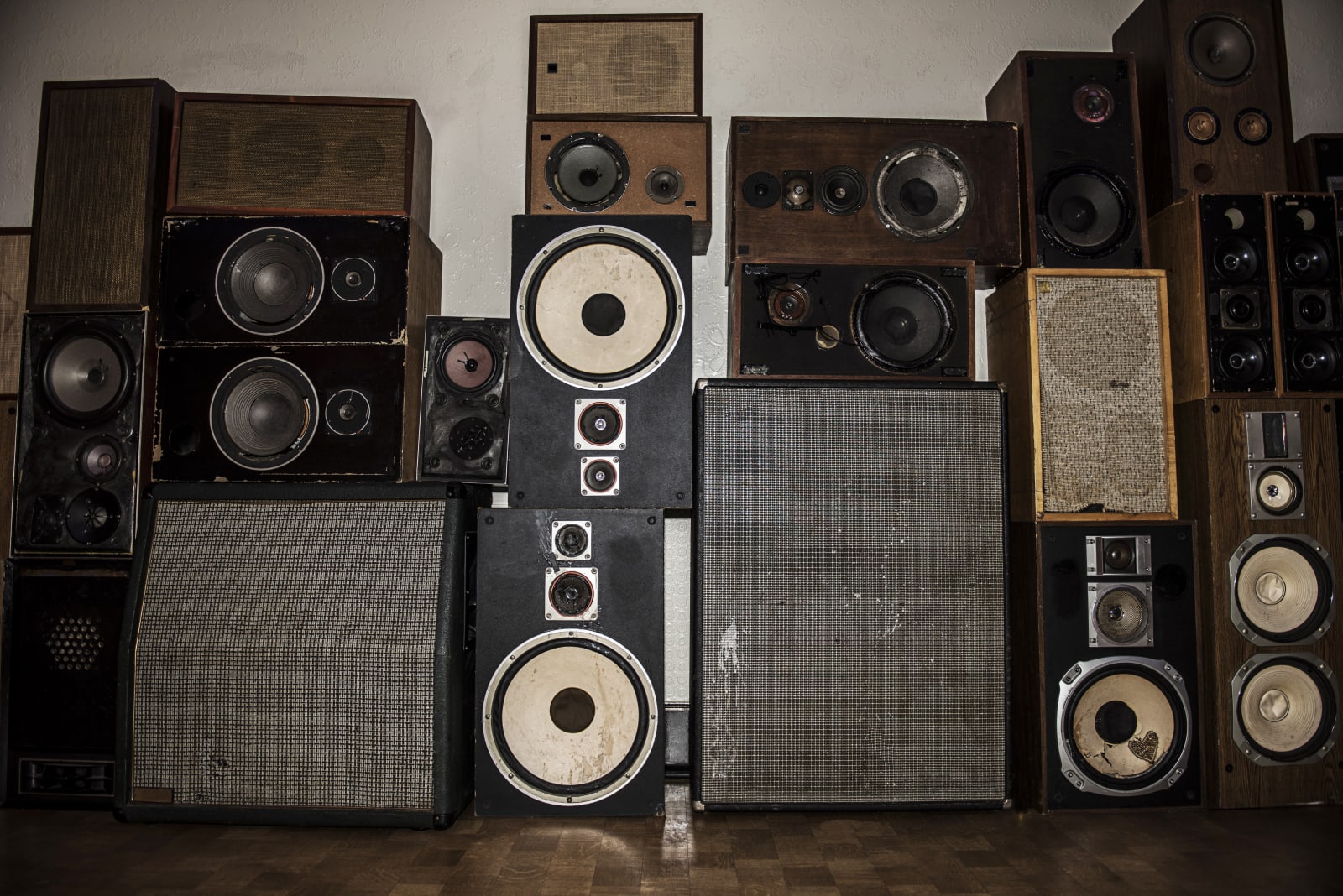 Wall of old speakers.