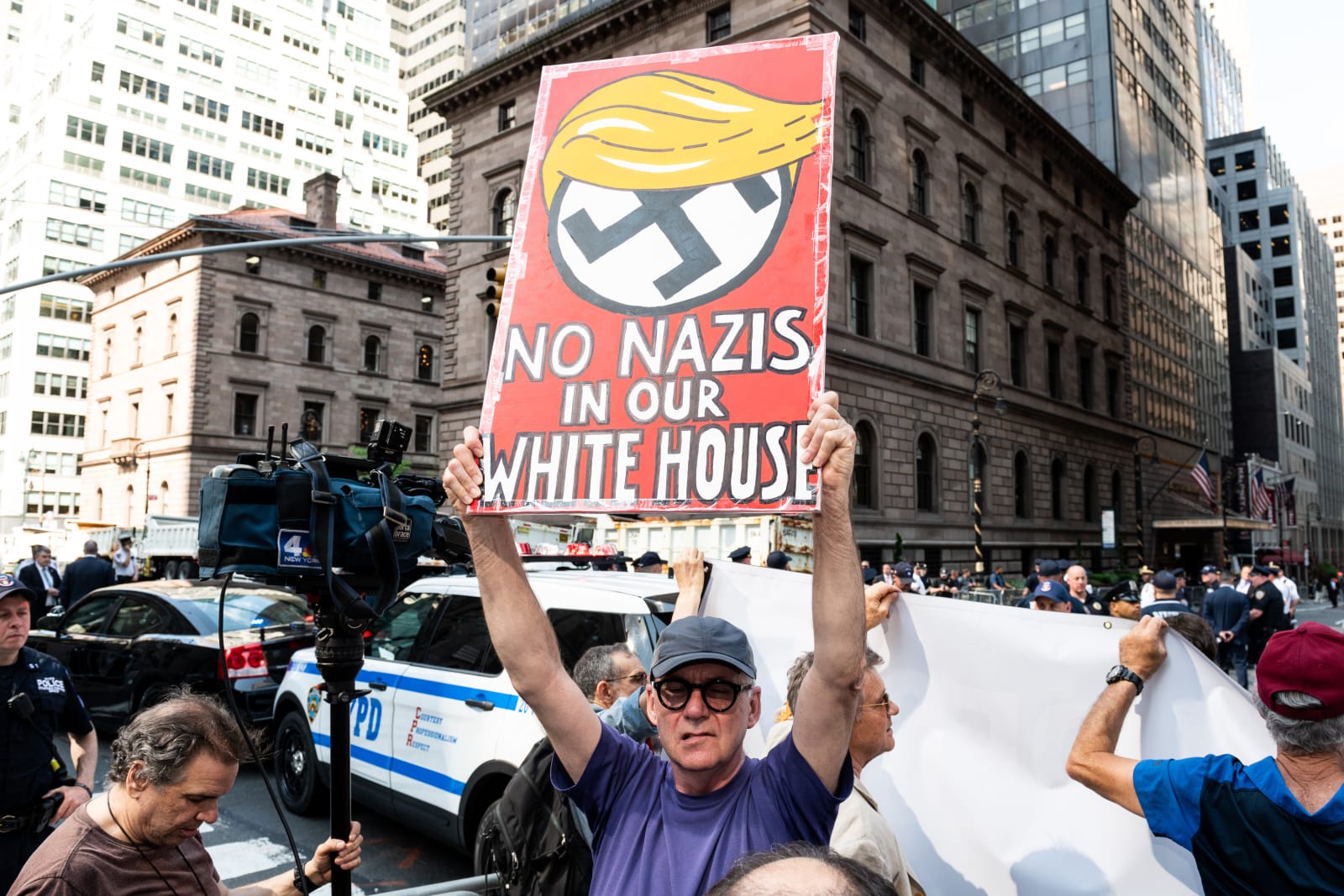 'No Nazis in our White House' sign at a protest rally...