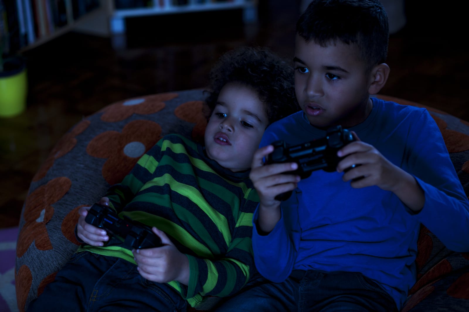 Two Friends Playing Video Game, at Night