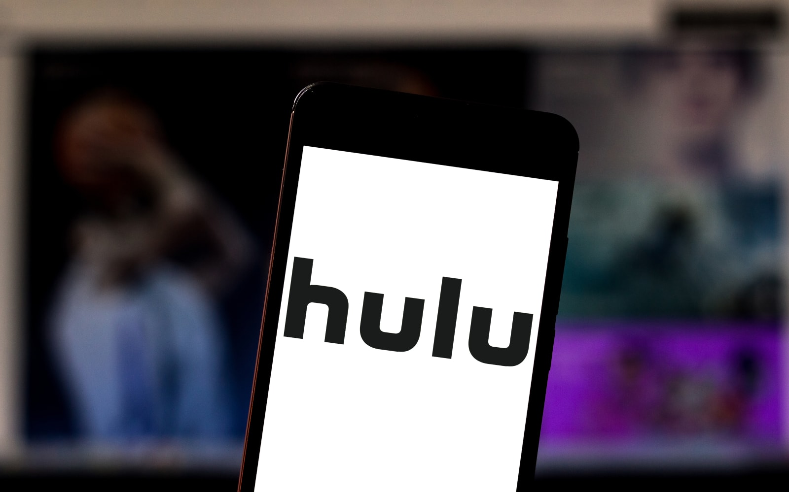 In this photo illustration the Hulu logo is seen displayed...