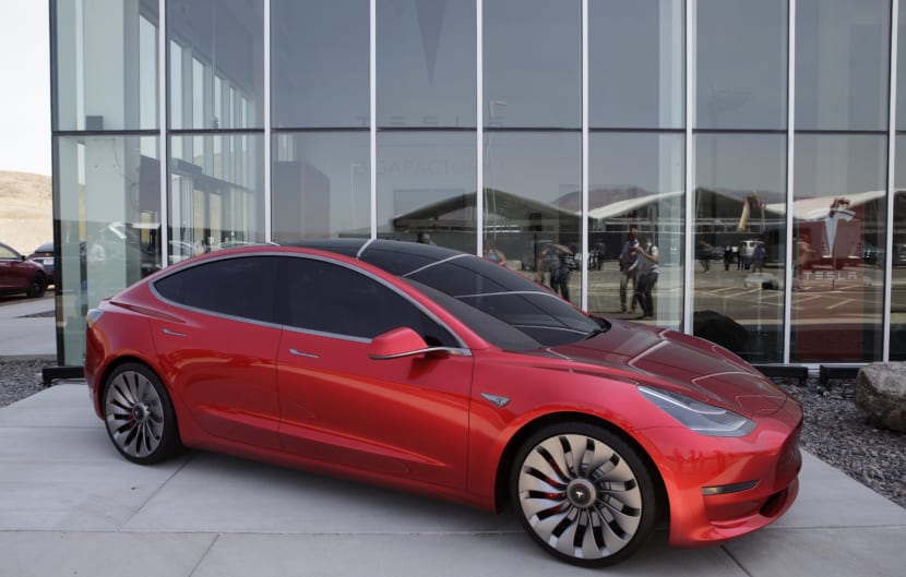 A Tesla Motor Inc. Model 3 vehicle is displayed outside the company's Gigafactory in Sparks, Neveada, U.S., on Tuesday, July 26, 2016. Tesla officially opened its Gigafactory on Tuesday, a little more than two years after construction began. The factory is about 14 percent complete but when it's finished, it will be about 10 million square feet, or about the size of 262 NFL football fields. Photographer: Troy Harvey/Bloomberg via Getty Images
