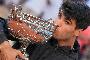 Carlos Alcaraz tops Alexander Zverev at the French Open for his third Grand Slam title at age 21